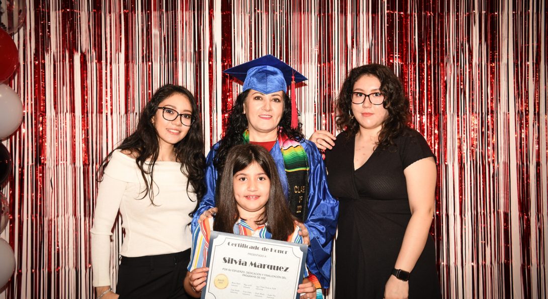 image of graduating family